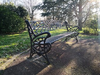 A peaceful bench in a park in Paris