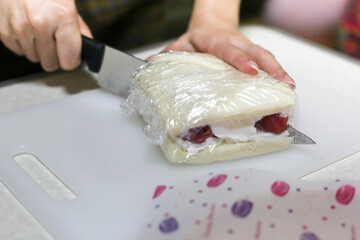 Making sandwich Strawberry fresh cream with fresh whipping cream.