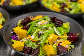Preparation of fresh salads in a professional kitchen