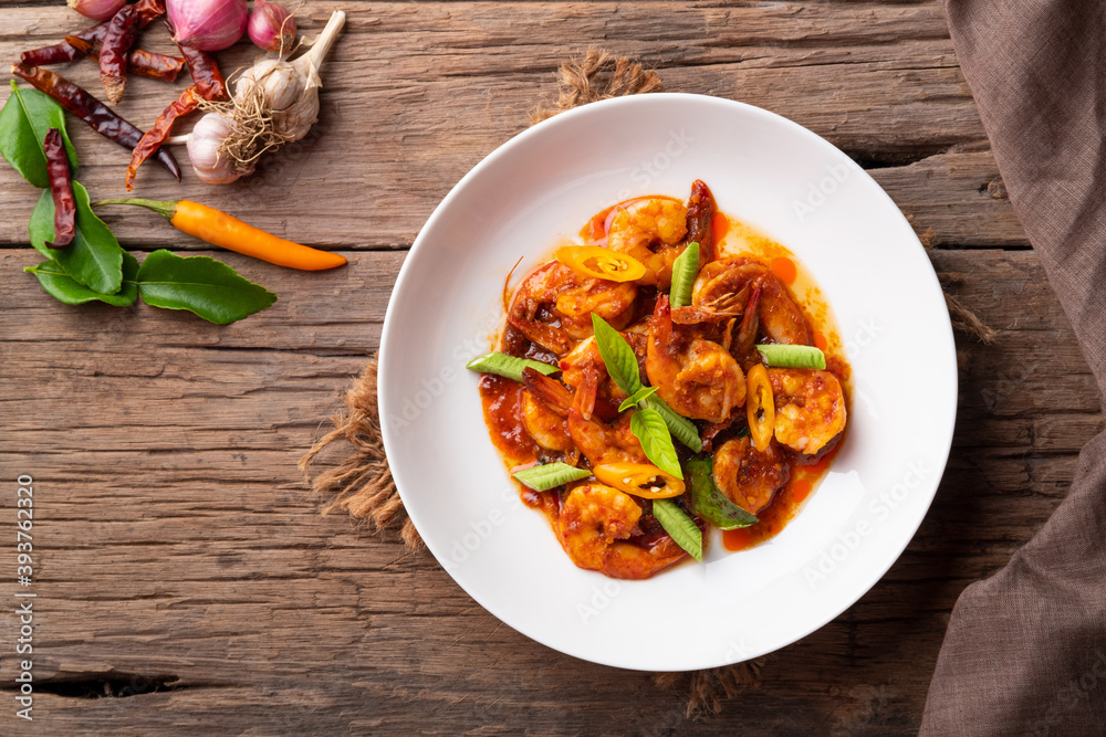 Wall mural stir fried shrimp with curry paste.top view