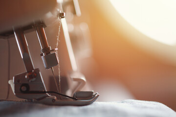 Close-up of sewing machine in fashion design studio