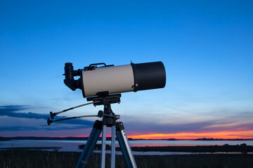 Telescope against the background of the evening sky