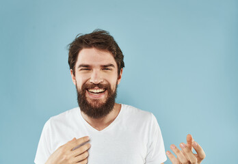 Happy guy in white t-shirt cropped look surprise joy