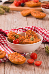 Toasted bread with tomato and oregano.