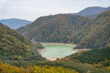 Futai Dam in autumn foliage season. Naeba, Yuzawa, Niigata Prefecture, Japan