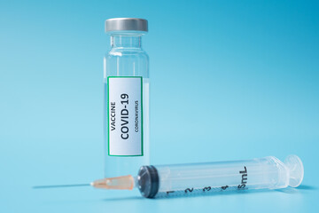 COVID-19 Vaccine vial and injection Needle Syringe against Coronavirus infection in hospital...