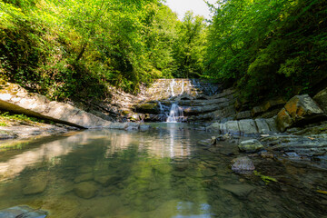 Waterfall mountain landscape. Place for relaxation and connecting with nature
