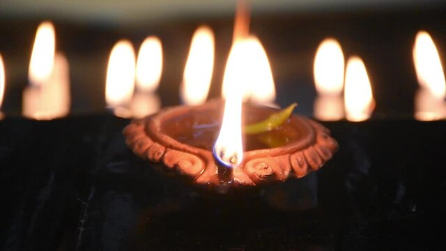 Traditional Diya Lamp Lits in night at Diwali, Deepabali , Deepavali or Deepawali - the festival of lights, is widely celebrated in India and now all over the world