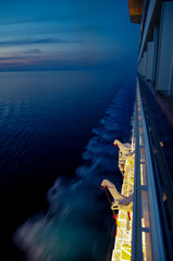 Dream holiday or vacation on luxury cruiseship or cruise ship liner at sea with sunset, sunrise or...