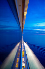 Dream holiday or vacation on luxury cruiseship or cruise ship liner at sea with sunset, sunrise or...