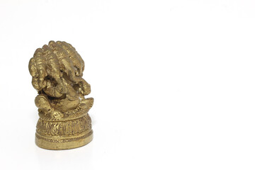 Brass Hindu God Ganesh on white background.