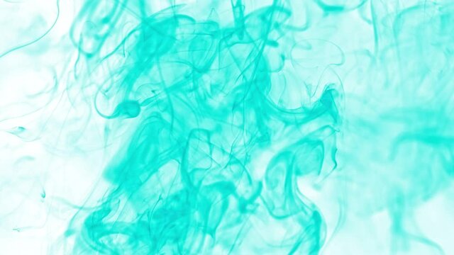 Super Slow Motion Shot of Flowing Green Smoke Isolated on White Background at 1000fps.