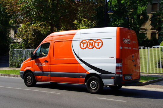 Bergamo, Lombardije, Italy - August 17, 2017:  TNT Express van parked by the side of the road in the city of Bergamo. TNT is an international courier delivery services company.