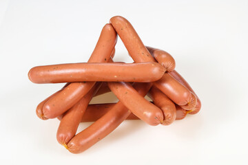 Tasty meat sausages over white background