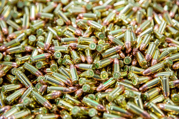 Golden ammunition. Bullets, magazines, rounds and ammunition.