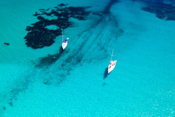 Aerial view of scenic blue lagoon Sakarun with anchored yachts, Dugi Otok island in Croatia