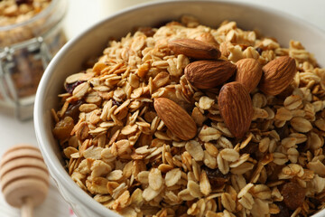 Bowl with granola and nuts, close up