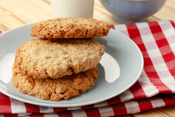 Oat cookies on wooden table close up
