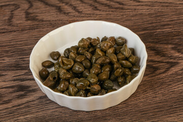 Tasty capers in the bowl