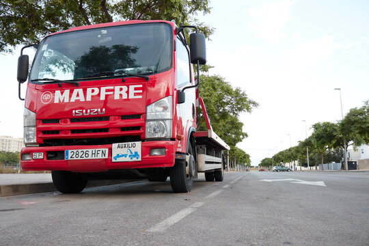 CASTELLON, SPAIN - AUGUST 2018 - Truck crane service assistance road Mapfre company parked in one of the streets of the city.