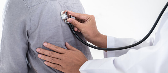 Doctor using a stethoscope checking patient with examining, presenting results symptom and recommend treatment method, Healthcare and medical concept