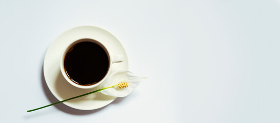 Cofe Americano with flower on white background