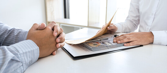 Dishonest cheating in business illegal money, Businessman giving bribe money in business people to accept agreement contract of investment deal, Bribery and corruption concept