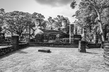 Landmark of Buddha image made of ancient bricks in the Kamphaeng Phet Historical Park, Thailand. Black and white