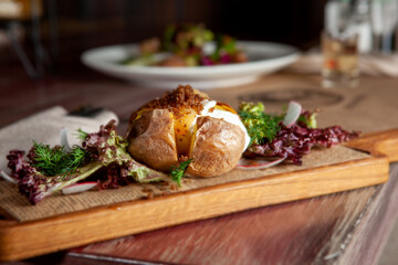 Baked whole potatoes with herbs