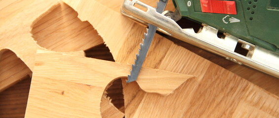 a jigsaw with sawn wood
