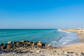 Fototapeta na wymiar Waves flushing the beach at Ras Al Khaimah, UAE