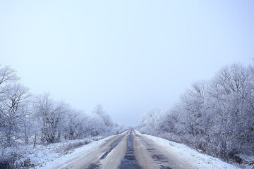 Obraz na płótnie Canvas winter road abstract landscape, seasonal path december snow