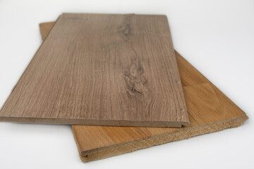 Comparison of laminate floor and wooden parquet floor