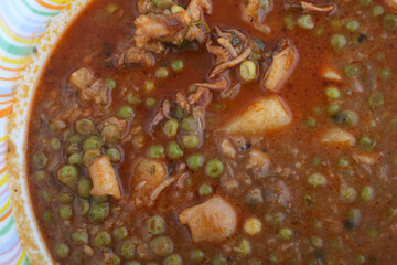 cuttlefish with green peas typical mediterranean gastronomy food