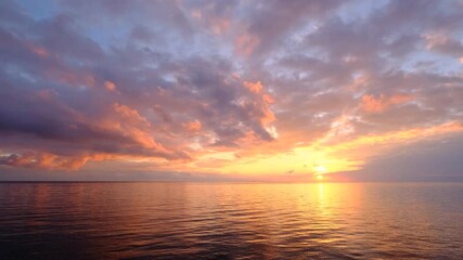 magical beautiful sunset on the beach. the sun dives into the golden waves. incredible sea landscape. Seascape, Summer and travel vacation concept - Powered by Adobe