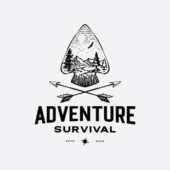 Spearhead and arrow with outdoor scenery for adventure logo