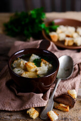 Chicken broth with croutons.style rustic