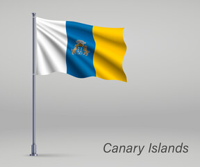 Waving flag of Canary Islands - region of Spain on flagpole. Template for independence day poster design