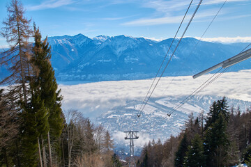 Winter landscape high in the mountains with blue sky and a sail track