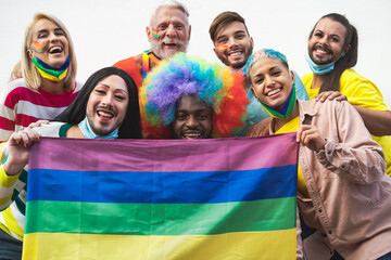 Happy Multiracial people celebrating gay pride festival during corona virus - Group of friends with...