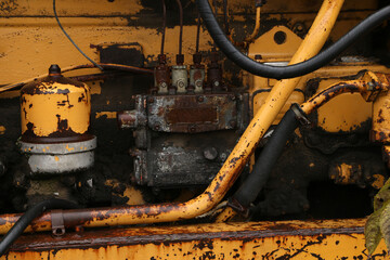 elements of the old yellow tractor
