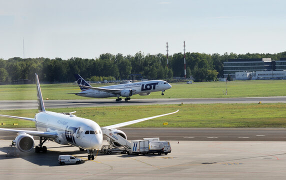 Warsaw, Poland. 15 April 2018. Passenger plane PLL LOT Boeing Dreamliner is flying up from runway of airport Chopin in Warsaw 