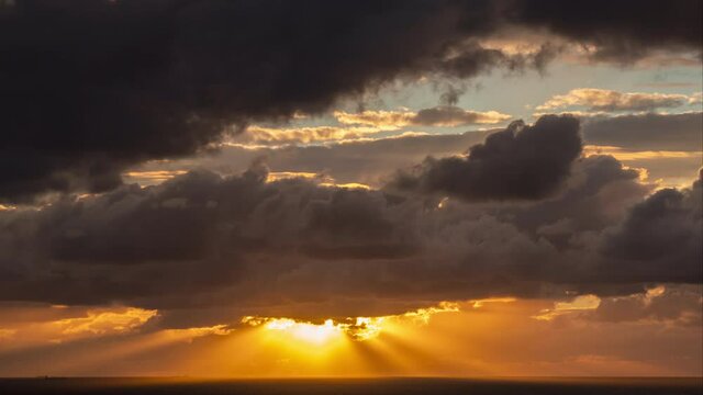 Gorgeous colorful Timelapse sunset at the sea