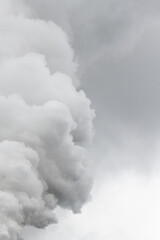 Obraz premium Smoking pipes of thermal power plant with dramatic dark cloudy sky