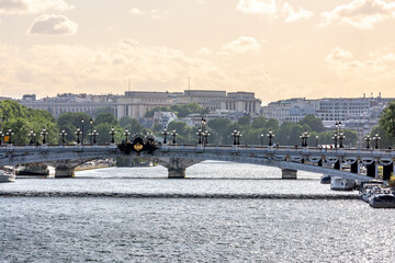 Paris, France - May 23, 2020: The Pont Alexandre III is a deck arch bridge that spans the Seine in Paris. It connects the Champs-Élysees quarter with those of the Invalides and Eiffel Tower.