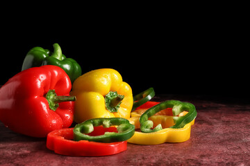 Fresh bell peppers on grunge background