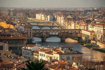 Florence at sunset with Arno river and Ponte Vecchio