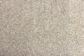 Texture of motley granite gray and red slab.