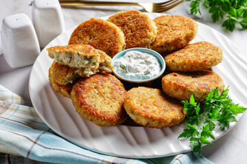 Easy fish cakes on a plate with tartar sauce