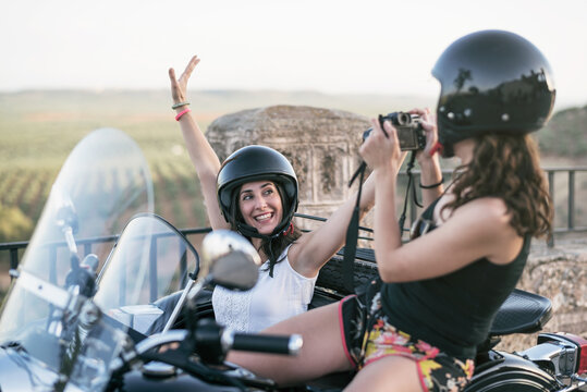 Women on sidecar. Taking pictures in Jaen, Spain.